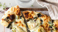 artichoke pizza with spinach parmesan cream sauce artichoke pizza with spinach parmesan cream sauce