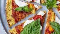 CAULIFLOWER BROCCOLI PIZZA CRUST with marinara, fresh mozzarella, tomatoes, and basil CAULIFLOWER BROCCOLI PIZZA CRUST with marinara, fresh mozzarella, tomatoes, and basil