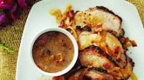 Roast pork loin with bacon-cider gravy Roast pork loin with bacon-cider gravy
