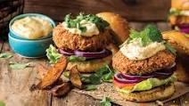 Crumbed and Deep-fried Rustler Beef Burgers with Cheese Sauce and Potato Wedges Crumbed and Deep-fried Rustler Beef Burgers with Cheese Sauce and Potato Wedges