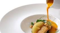 Pumpkin velouté with chicken wings, apples and almonds Pumpkin velouté with chicken wings, apples and almonds