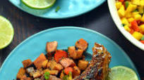 Jamaican Jerk Pork Chops with Curry-Spiced Sweet Potatoes and Mango Salsa Jamaican Jerk Pork Chops with Curry-Spiced Sweet Potatoes and Mango Salsa