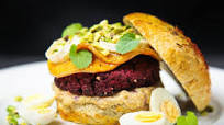 Beet falafel burger with baba ganoush, cardamom roasted butternut squash, chèvre and pistachios Beet falafel burger with baba ganoush, cardamom roasted butternut squash, chèvre and pistachios