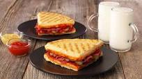 Dört Peynirli Pizza'dan Karışık Tost Dört Peynirli Pizza'dan Karışık Tost