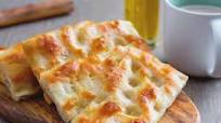 Focaccia (fügassa) alla genovese (Genoa-style focaccia) Focaccia (fügassa) alla genovese (Genoa-style focaccia)