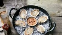 Iced Oysters with Bitter Lemon Vinaigrette Iced Oysters with Bitter Lemon Vinaigrette