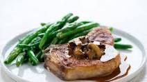 Marsala Mushroom Smothered Bone-In Pork Chop with rosemary-scented green beans Marsala Mushroom Smothered Bone-In Pork Chop with rosemary-scented green beans