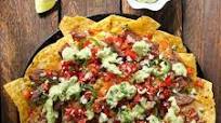 Grilled Surf 'n Turf Party Nachos with Avocado Cotija Sauce Grilled Surf 'n Turf Party Nachos with Avocado Cotija Sauce