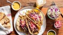Pork carnitas tacos with pickled onions and salsa verde Pork carnitas tacos with pickled onions and salsa verde
