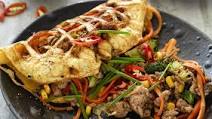 Egg net omelette with spicy pork and veges Egg net omelette with spicy pork and veges