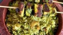Hariyali Paneer Tikka Biryani with Raita Hariyali Paneer Tikka Biryani with Raita