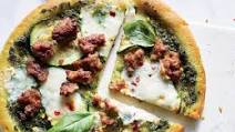 This Zucchini-Pesto-Sausage Pizza Has Less Than 400 Calories This Zucchini-Pesto-Sausage Pizza Has Less Than 400 Calories