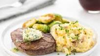 Sirloin Steak and Maitre d'Hotel Butter with garlic-cheddar mashed potatoes and Brussels sprouts Sirloin Steak and Maitre d'Hotel Butter with garlic-cheddar mashed potatoes and Brussels sprouts
