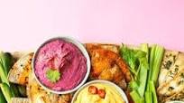 Tortilla chips with hummus and dip Tortilla chips with hummus and dip