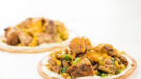 Spicy Green Chili Chicken Thigh Tostadas with corn and cheddar cheese Spicy Green Chili Chicken Thigh Tostadas with corn and cheddar cheese