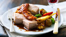 Roast belly of pork with root vegetables Roast belly of pork with root vegetables