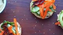 Hummus, Veggie and Bacon Bagel Sandwiches Hummus, Veggie and Bacon Bagel Sandwiches