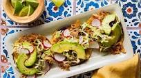 Pork carnitas tacos with cabbage slaw and avocado Pork carnitas tacos with cabbage slaw and avocado