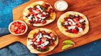 Tostadas Supremas with Pork topped with Poblano, Lime Crema & Pico de Gallo Tostadas Supremas with Pork topped with Poblano, Lime Crema & Pico de Gallo