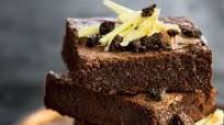 Brownies with berry sauce and crushed oreos Brownies with berry sauce and crushed oreos