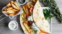 Grilled haloumi gyros with tzatziki and oven-baked herb salted fries Grilled haloumi gyros with tzatziki and oven-baked herb salted fries