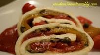 Rotolo di mozzarella con melanzane e peperoni Rotolo di mozzarella con melanzane e peperoni