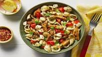 Chicken Caprese Pasta Salad served warm with Basil and Lemon Chicken Caprese Pasta Salad served warm with Basil and Lemon