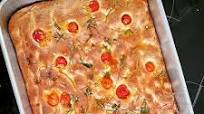 Focaccia with parsley, cherry tomatoes and rosemary Focaccia with parsley, cherry tomatoes and rosemary