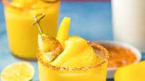 Frozen Mango margarita with Tajin Seasoning Frozen Mango margarita with Tajin Seasoning