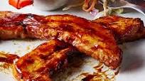 Pork belly BBQ teriyaki sauce with coleslaw and fries Pork belly BBQ teriyaki sauce with coleslaw and fries