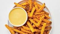 Seasoned Fries with Cheese Sauce Seasoned Fries with Cheese Sauce