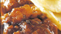 Lamb in tomato sauce with fried potatoes Lamb in tomato sauce with fried potatoes