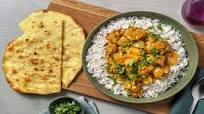Chicken Korma-Style Curry with Rice and Garlic Naan Chicken Korma-Style Curry with Rice and Garlic Naan
