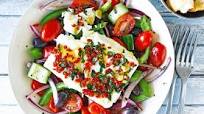 Baked feta with Greek salad and pitta chips Baked feta with Greek salad and pitta chips