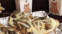 Bruschette con funghi e scamorza affumicata Bruschette con funghi e scamorza affumicata