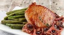 Pan Roasted Pork Chop with Dried Plums With Roasted Green Beans and Sweet Vinegar Reduction