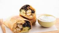 Fried Chicken and Avocado Chimichanga with black beans and cilantro-lime crema Fried Chicken and Avocado Chimichanga with black beans and cilantro-lime crema