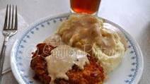 Crispy Breaded Pork Chops with Milk Gravy Crispy Breaded Pork Chops with Milk Gravy