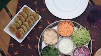 Chickpea Falafel Wraps with Tomatoes & Tzatziki Chickpea Falafel Wraps with Tomatoes & Tzatziki