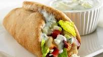 Greek Chicken Wrap with Tzatziki Herb Yogurt Sauce Greek Chicken Wrap with Tzatziki Herb Yogurt Sauce