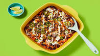 One-Pan Rice & Bean Enchilada Bake with Pickled Jalapeño, Zesty Crema & Blue Corn Tortilla Chips One-Pan Rice & Bean Enchilada Bake with Pickled Jalapeño, Zesty Crema & Blue Corn Tortilla Chips