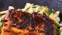 Paprika crusted salmon on spinach hummus Paprika crusted salmon on spinach hummus