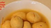 Kesar Rasgulla / Saffron Cottage Cheese Balls In Sugar Syrup Kesar Rasgulla / Saffron Cottage Cheese Balls In Sugar Syrup
