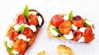 Confit Tomato Bruschettas with Pesto & Mozzarella Confit Tomato Bruschettas with Pesto & Mozzarella