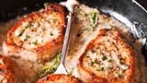 Boneless Pork Chops in Creamy Garlic and Herb Wine Sauce Boneless Pork Chops in Creamy Garlic and Herb Wine Sauce