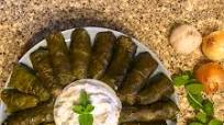Armenian Dolma (Tolma) Served With Yoghurt-Mint Sauce. Armenian Dolma (Tolma) Served With Yoghurt-Mint Sauce.