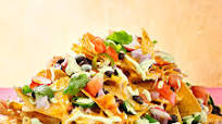 Mile-High Nachos Supreme with Avocado Cream Mile-High Nachos Supreme with Avocado Cream