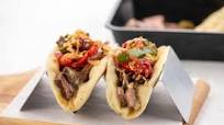 Philly-Style Cheesesteak Gyros with Peppers and Onions no prep, quick cook Philly-Style Cheesesteak Gyros with Peppers and Onions no prep, quick cook