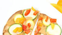Easy Roasted Veggie and Hummus Tortilla Pizza Easy Roasted Veggie and Hummus Tortilla Pizza