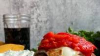 Mediterranean Burgers with Fried Halloumi, Roasted Red Peppers, Tzatziki, & Garlic Hummus with a Cilantro Goat Cheese Spread Mediterranean Burgers with Fried Halloumi, Roasted Red Peppers, Tzatziki, & Garlic Hummus with a Cilantro Goat Cheese Spread